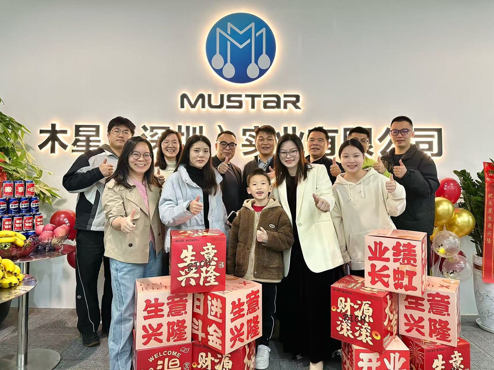 Cross-department staff celebration at Mustar's annual company meeting