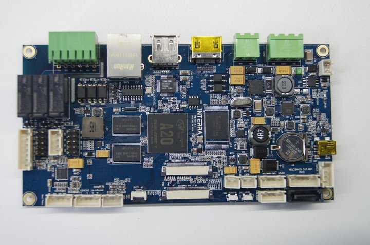 Automated pick-and-place machine placing electronic components on a PCB during PCBA process.